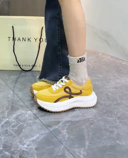 Yellow heightening leisure sports shoes