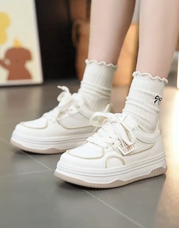 Soft-soled and soft-surfaced white casual shoes