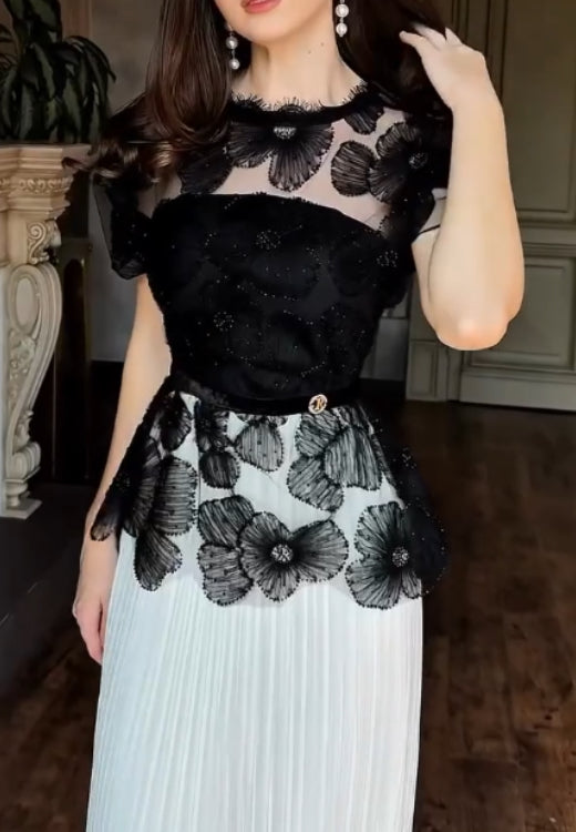 Elegant hand-embroidered lace top