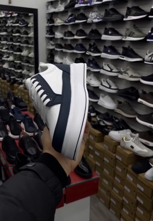 Men's black and white stitching heightening casual shoes