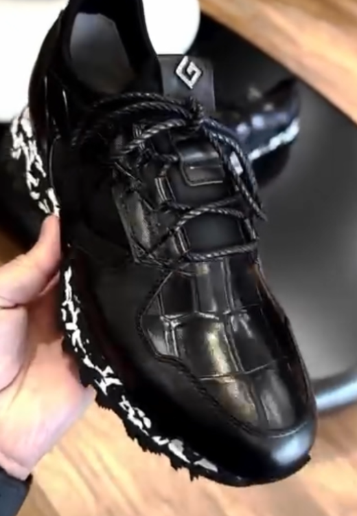 Men's black leather sneakers with snowflake soles