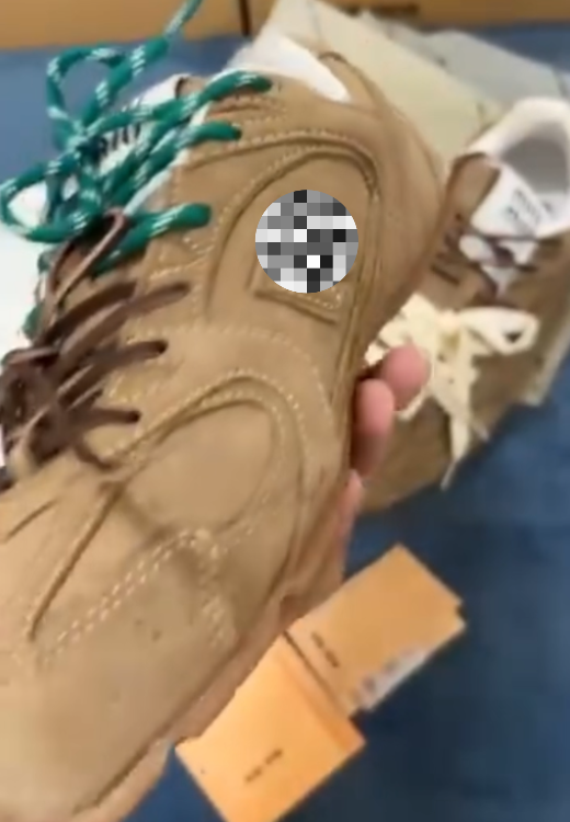 Tan sneakers orange shoelaces