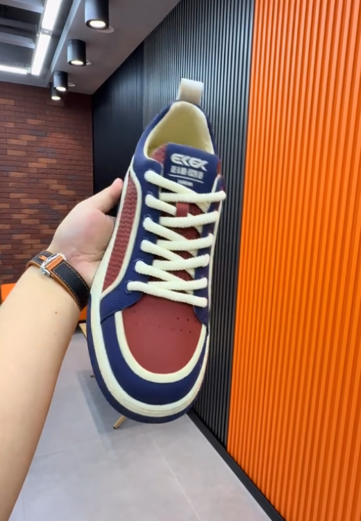 Classic sneakers with red and blue color matching