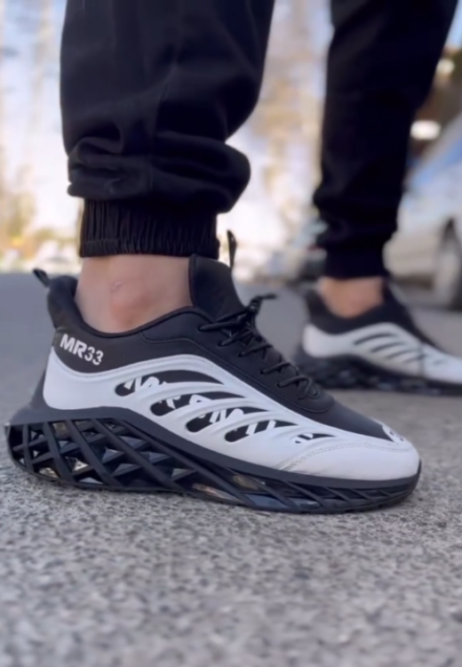 Men's jogging shoes with crossed soles in grid