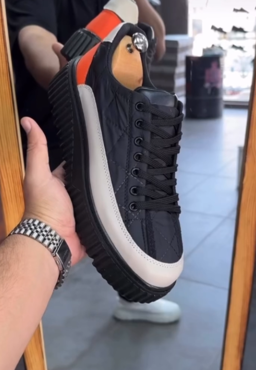 Soft-faced leisure shoes with waterproof and raised soles