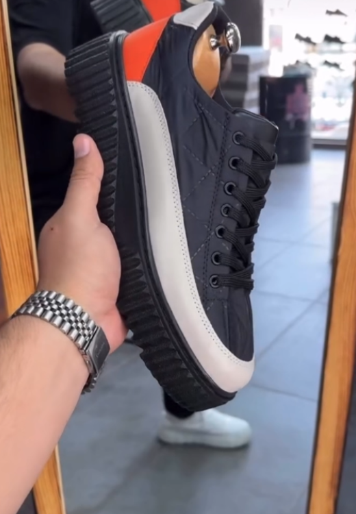 Soft-faced leisure shoes with waterproof and raised soles