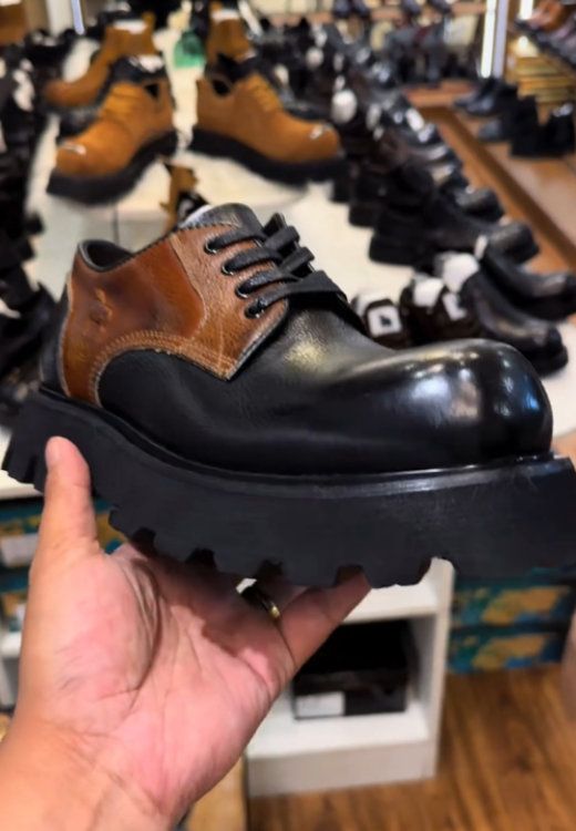 Heightened spliced round leather shoes