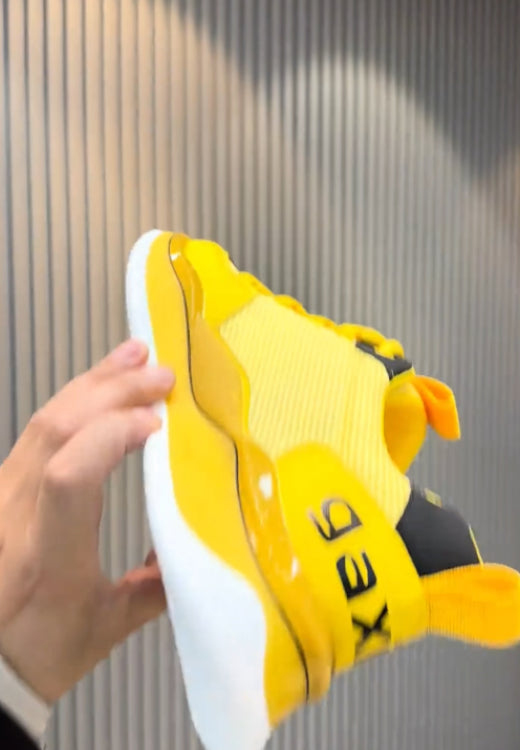 Yellow and black mesh cheetah sneakers