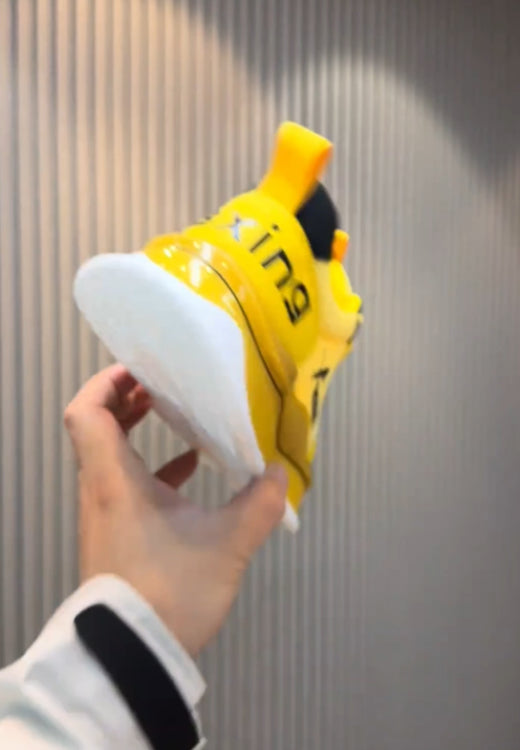 Yellow and black mesh cheetah sneakers