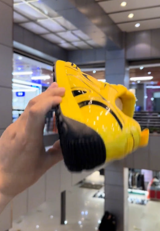 Functional style yellow and black sneakers