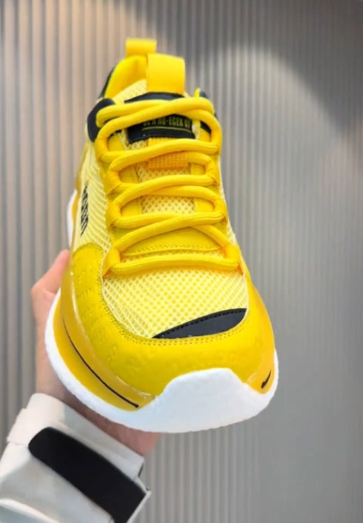 Yellow and black mesh cheetah sneakers
