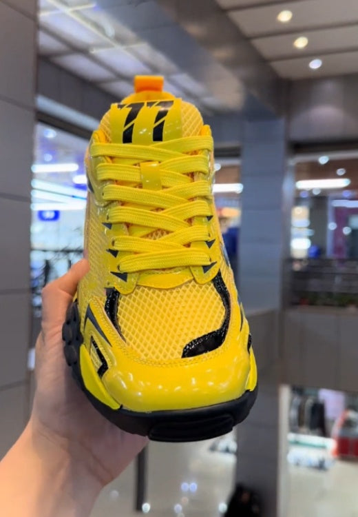 Functional style yellow and black sneakers