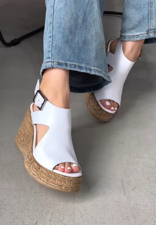 Elegant white soft leather wedge sandals