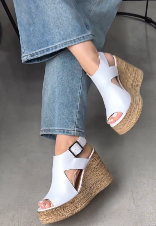 Elegant white soft leather wedge sandals