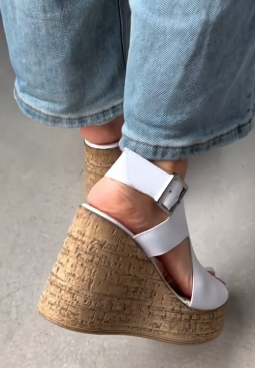 Elegant white soft leather wedge sandals