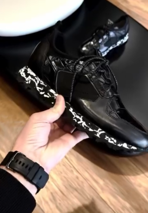 Men's black leather sneakers with snowflake soles