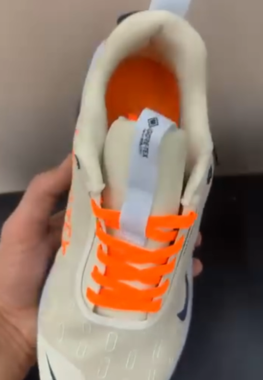 Orange shoelace vitality sneakers