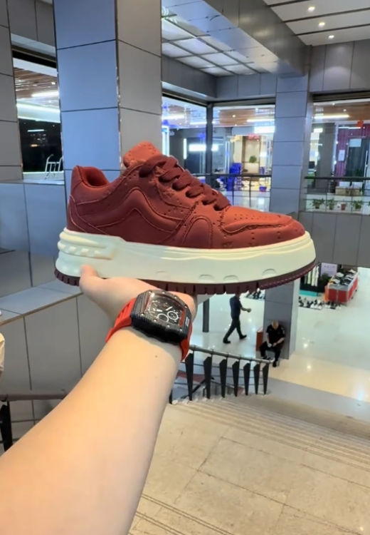 Red printed sneakers with high and thick soles