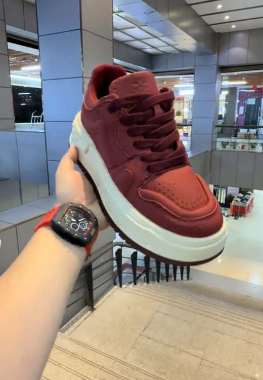 Red printed sneakers with high and thick soles