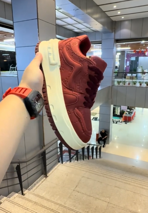 Red printed sneakers with high and thick soles