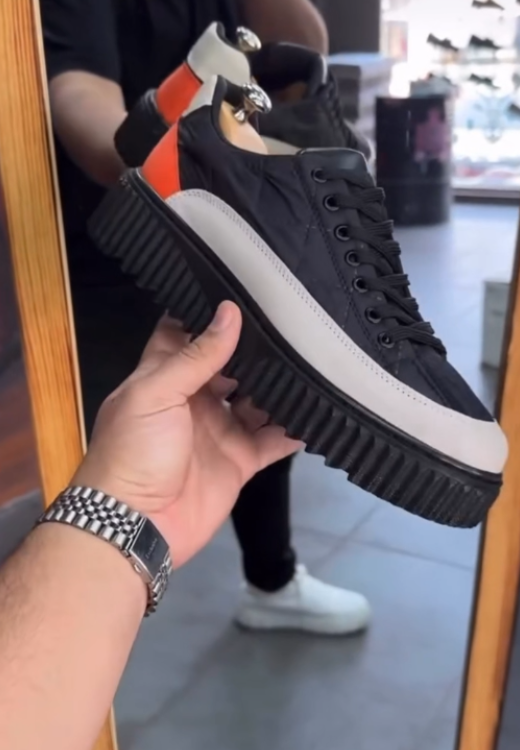 Soft-faced leisure shoes with waterproof and raised soles